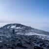 a rocky beach with snow